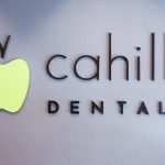 Cahill Dental logo on a wall